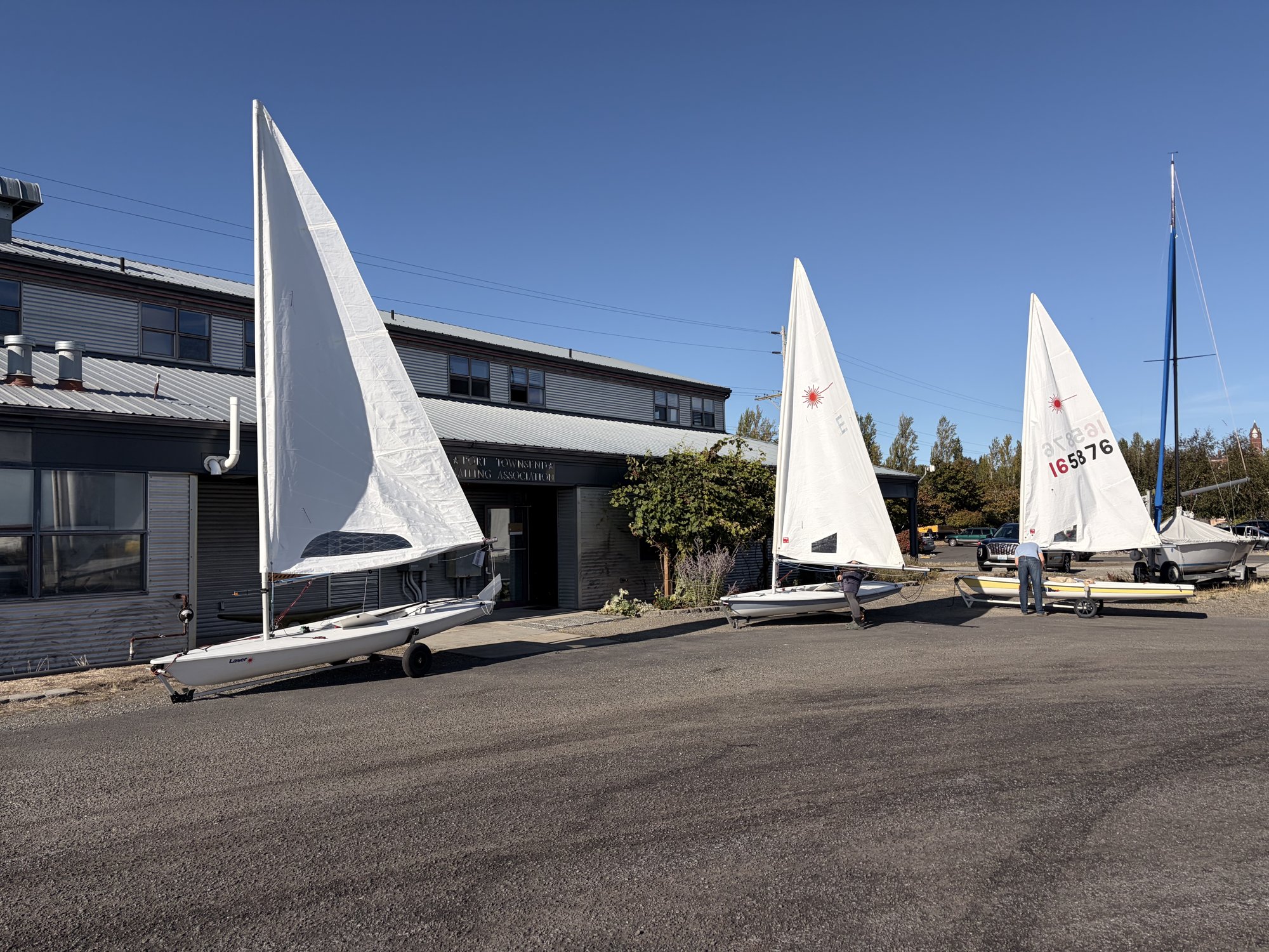 Three Lasers rigged on dollies outside the PTSA building